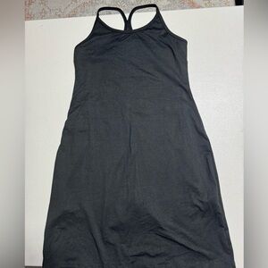 Woman’s Kyodan Black mini dress with built in shorts. Size XS